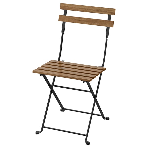 Židle TÄRNÖ: skládací a klasický design, dřevěný sedák a opěradlo, černý kovový rám.