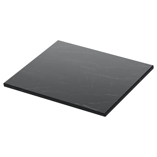 Černá deska se vzhledem mramoru, obdélníková, elegantní moderní design.