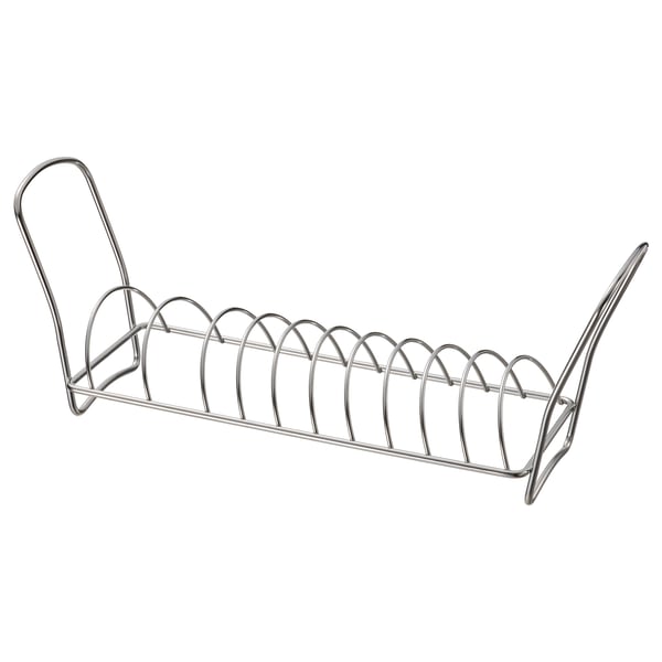 Stříbrný kovový stojan na nádobí, zakřivená rukojeť, drátěný design.
