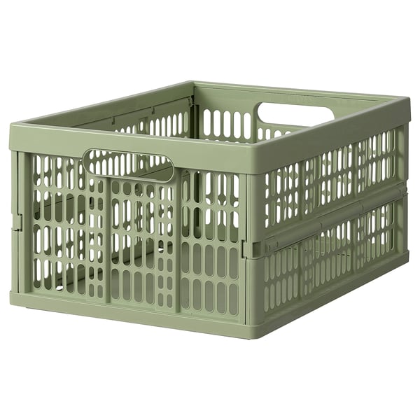 Světle zelený plastový úložný box VEDKLYV s madly a ventilací.