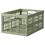 Světle zelený plastový úložný box VEDKLYV s madly a ventilací.