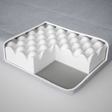 Cross-sectioned cushion showing foam and polyester layers, illustrating internal structure.
