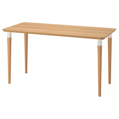 An ANFALLARE desk, light brown with white accents, made from bamboo, rectangular and sleek in design.