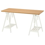 A white ANFALLARE desk with a wooden top, featuring trestle legs and a shelf underneath.