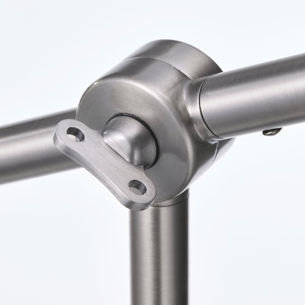 Metal lamp joint close-up. Brushed finish, adjustable angles, clean, modern design.