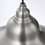 Sleek metal lamp with smooth texture, reflecting light gently. Modern design with shiny finish.
