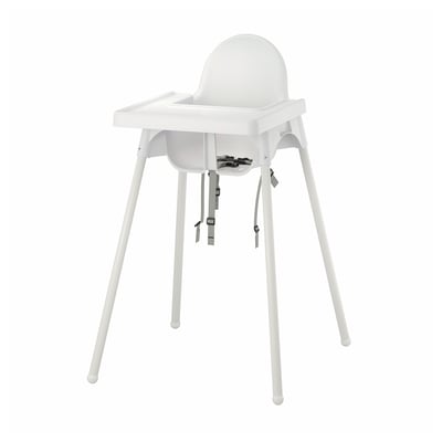 White ANTILOP highchair; plastic seat, metal legs, adjustable straps.
