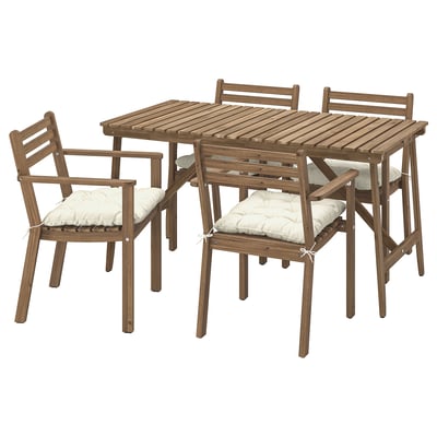 Wooden outdoor table and four chairs with beige cushions, simple and functional design.