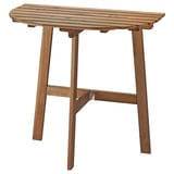 Its an ASKHOLMEN wooden balcony table, light brown, rectangular, and foldable for space-saving.