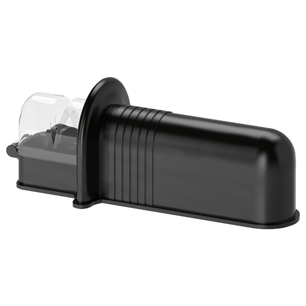 A black ASPEKT knife sharpener, featuring vertical grooves and a clear lid, ideal for maintaining sharp knives.
