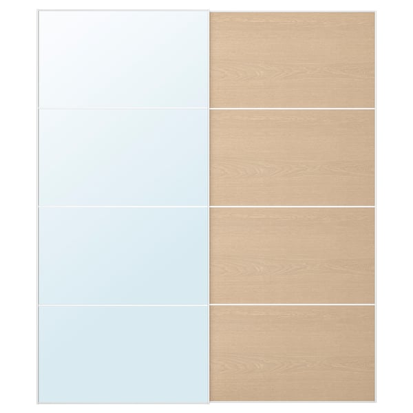 The AULI sliding door set a mirrored and a wood-toned panel, framed in aluminum.