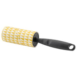 BÄSTIS lint roller with yellow & white pattern, black handle for removing hair, dust, lint from clothes & furniture.