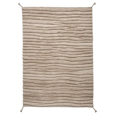 The bankkotor rug, a beige rectangular floor covering with a textured, wavy design, handwoven from pure wool.