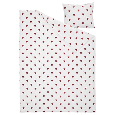 Heart-patterned white duvet and pillow set. Red hearts, soft cotton, zipper closure.