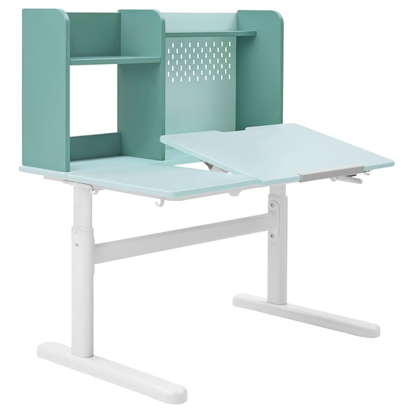 Ikea BERGLÄRKA desk in light green with white legs, adjustable height, has shelves and storage.