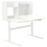 White BERGLÄRKA adjustable desk with storage units.