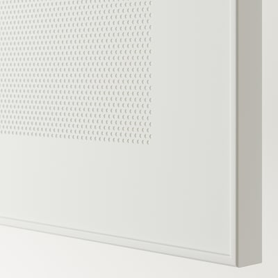 White BESTÅ storage unit with perforated metal door, quality finish, clean design.