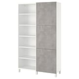 White BESTÅ storage unit with gray doors, modular shelves, adjustable.