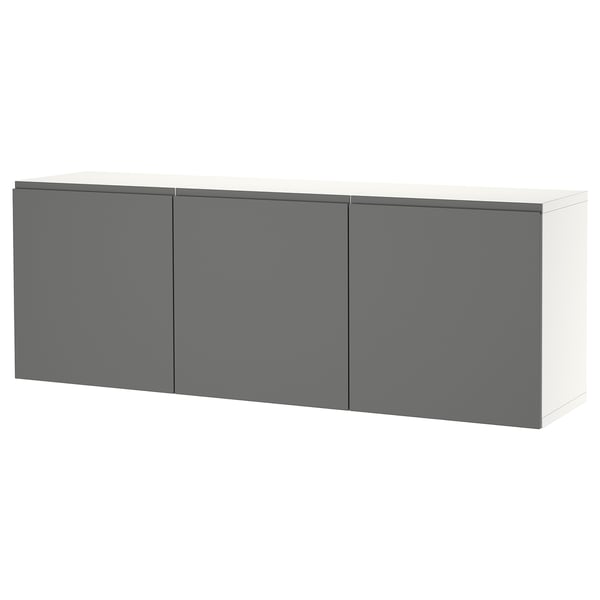 A white and gray BESTÅ wall-mounted cabinet with three doors offering modern storage.