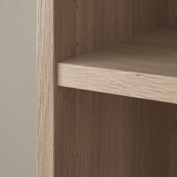 Wooden bookshelf corner detail, showing smooth finish and sturdy craftsmanship.