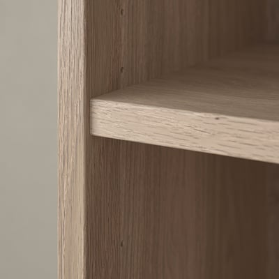 Wooden bookshelf corner detail, showing smooth finish and sturdy craftsmanship.