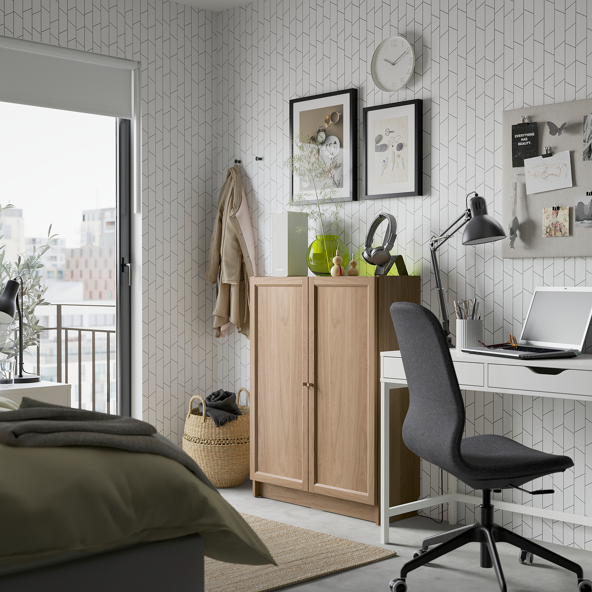 Modern bedroom with BILLY bookcase, desk & office chair, green-pillowed bed.
