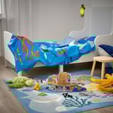 Kids ocean-themed rug with sea creatures, boat, & durable recycled polyester.