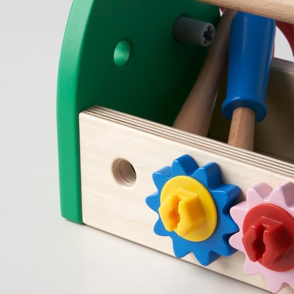 Wooden toy toolbox with colorful gears and tools; excellent quality for childs play.