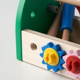 Wooden toy toolbox with colorful gears and tools; excellent quality for childs play.