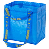 A blue BRATTBY shopping bag with yellow handles and designs. Its square, durable, easy-care, and folds flat.