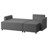 A gray BRISSUND sofa bed with sleek lines, upholstered in recycled polyester fabric, designed for versatility and comfort.