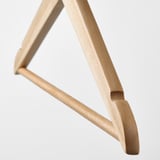 Wooden hanger with sleek design, showcasing premium craftsmanship and sturdy construction.