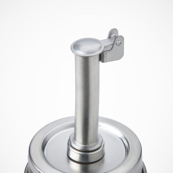 Silver metal lid with cylindrical handle attached to glass jar, showcasing durable design.