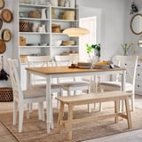 Modern dining set DANDERYD with natural oak top, white steel, and upholstered light beige chairs. Clean and cozy farmhouse style.