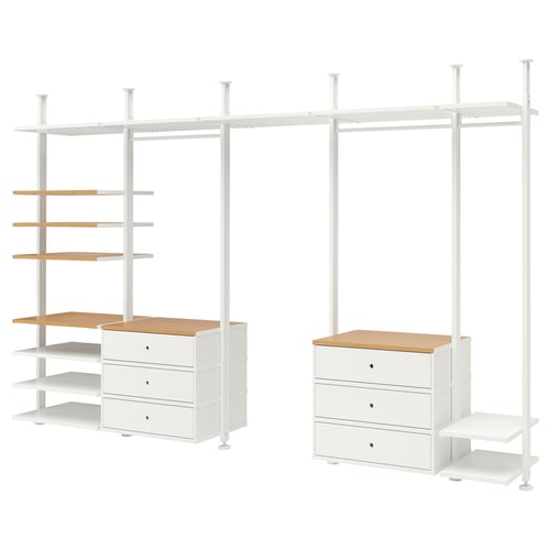 An ELVARLI storage system in white with bamboo accents. It includes shelves, drawers, and clothes rails.