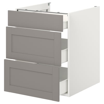 An ENHET kitchen cabinet in white with grey fronts and three drawers. It has a modern, minimalist design with a sturdy build and smooth drawer slides.