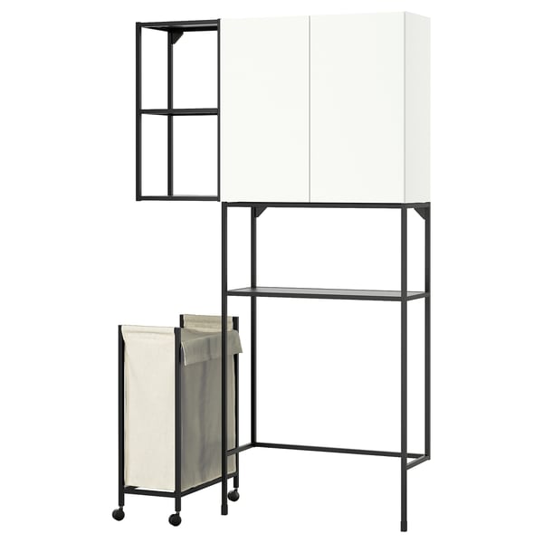 Displays an ENHET laundry organizer, featuring white cabinets and shelves with a black metal frame.