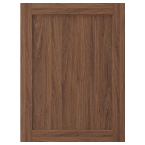 A dark brown wooden cabinet door with a classic, framed design.