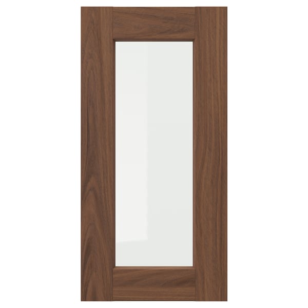 The ENKÖPING brown walnut framed glass cabinet door. It a classic, inviting design with a durable wood-like finish and a clear glass center.