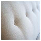 Close-up: ESSEBODA sofa in beige, soft fabric, deep seat, high back, elegant details.