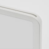 White plastic photo frame with rounded edges, showing minimalistic design.