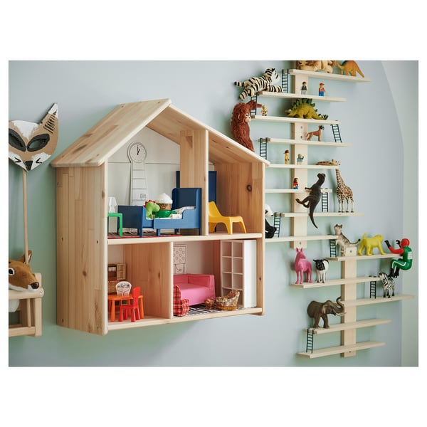 Wooden dollhouse shelf with colorful toys and owl.