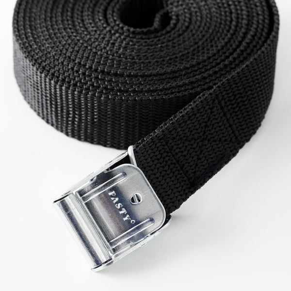 Black strap with metal buckle, branded FRAKTA.