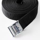 Black strap with metal buckle, branded FRAKTA.