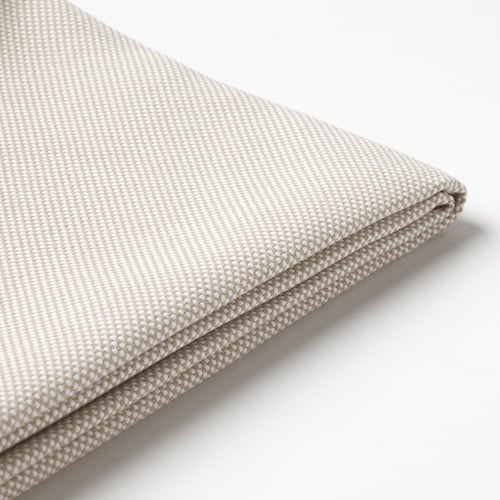 Close-up of folded, textured beige outdoor fabric with subtle stripes, laid on white surface.