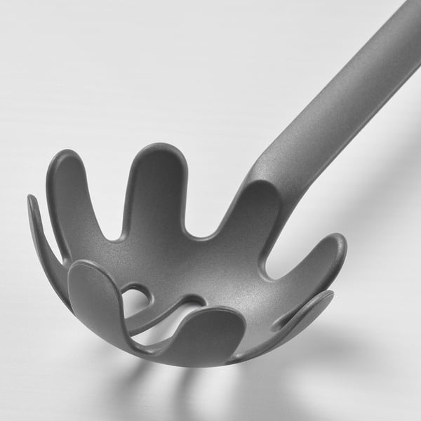 Close-up of a durable, grey plastic spaghetti server, ideal for non-stick cookware.