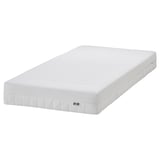 Ikea GLAMBERGET: white, rectangular, extendable bed with a textured foam mattress.