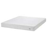 White IKEA GLAMBERGET extendable bed with foam mattress. Solid pine frame, space-saving, fits small rooms.