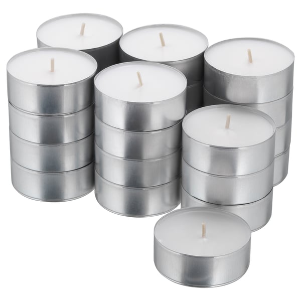 Pile of 12 silver tea light candles; round, metallic, white wax, cotton wicks.