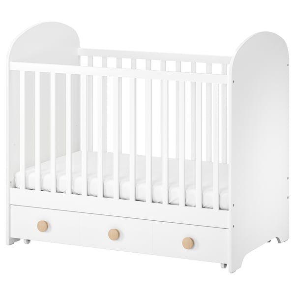 White GONATT wooden baby cot, arched top, spacious drawer, sturdy, safe design.